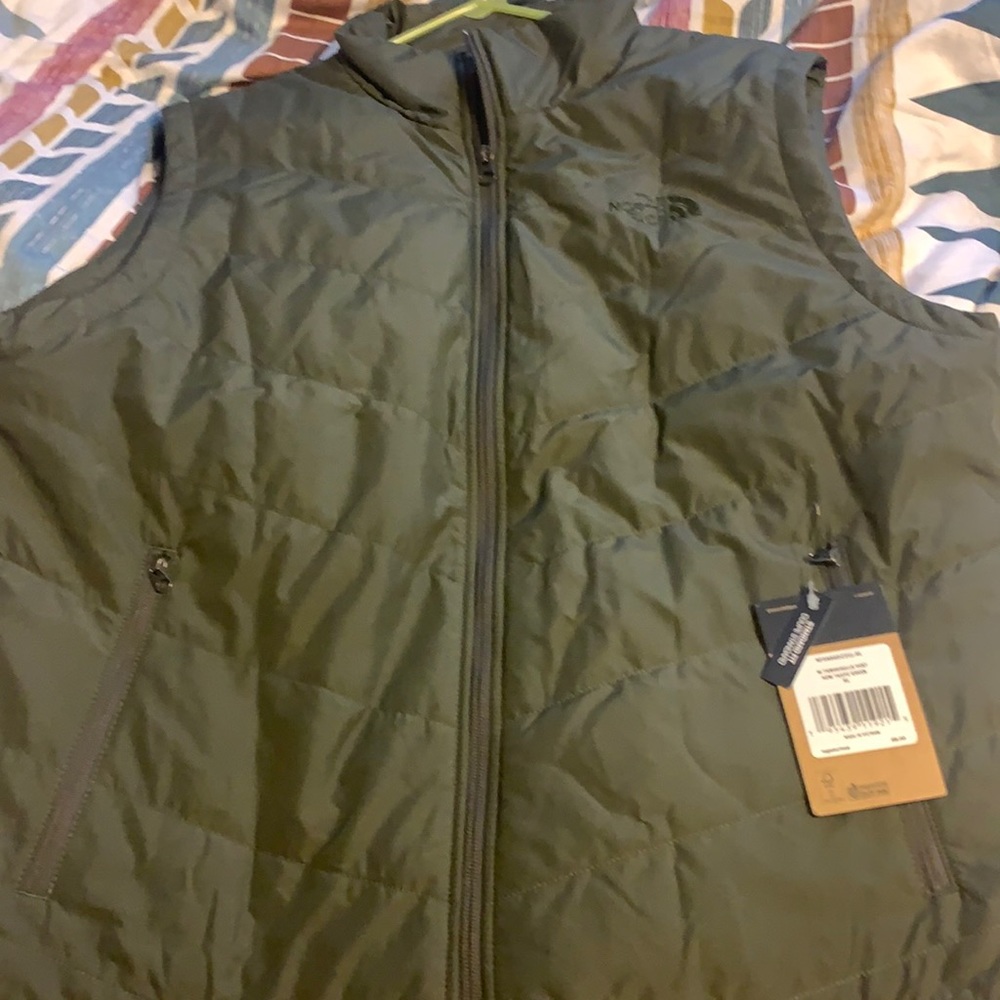 North face vest new with tags never worn